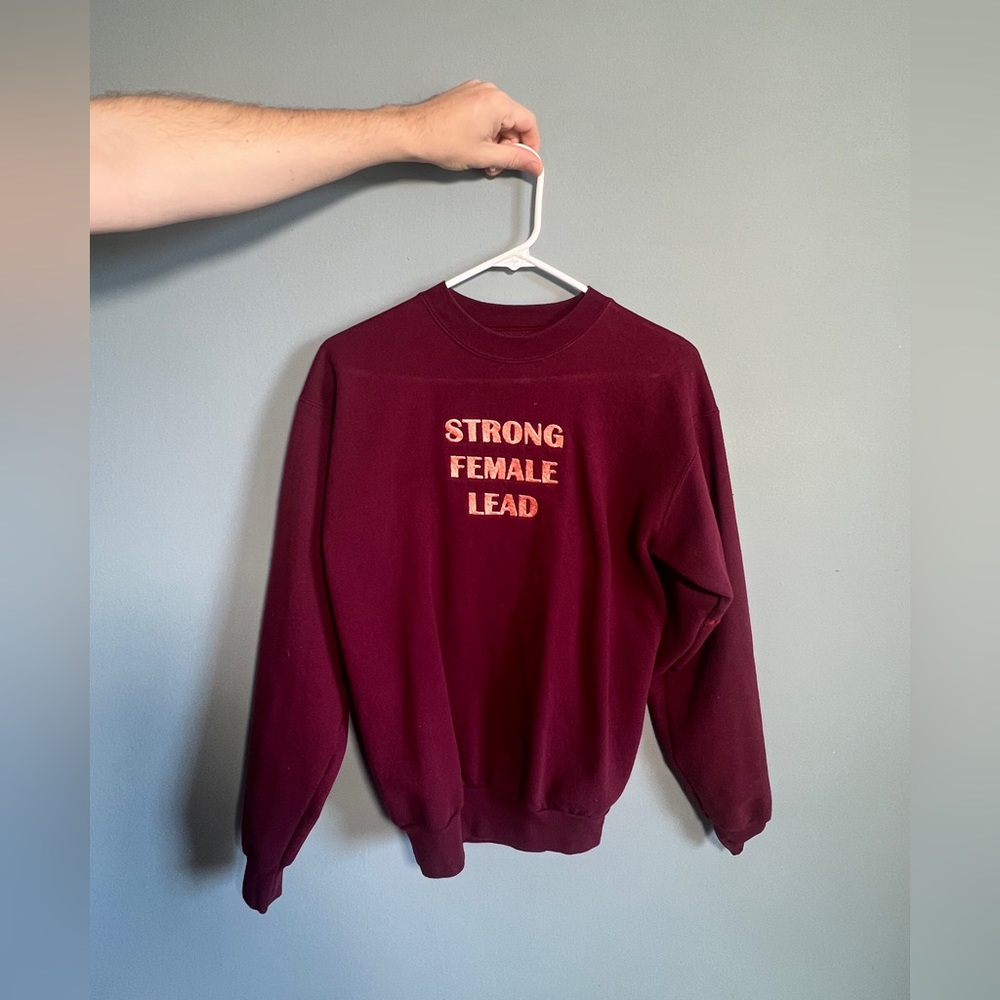 Burgundy Strong Female Lead sweatshirt